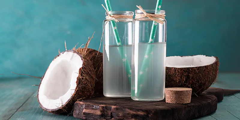 Coconut water in a glass - Indian diet for glowing skin.