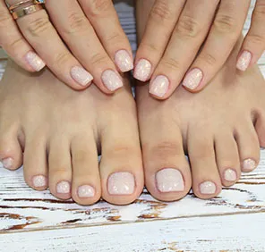 Beautiful hands and feet after a manicure and pedicure.