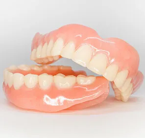 A pair of complete implant supported dentures.
