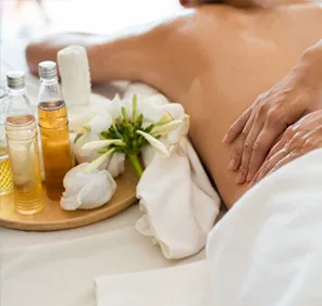 Herbal oils are used during massage for muscle strain.
